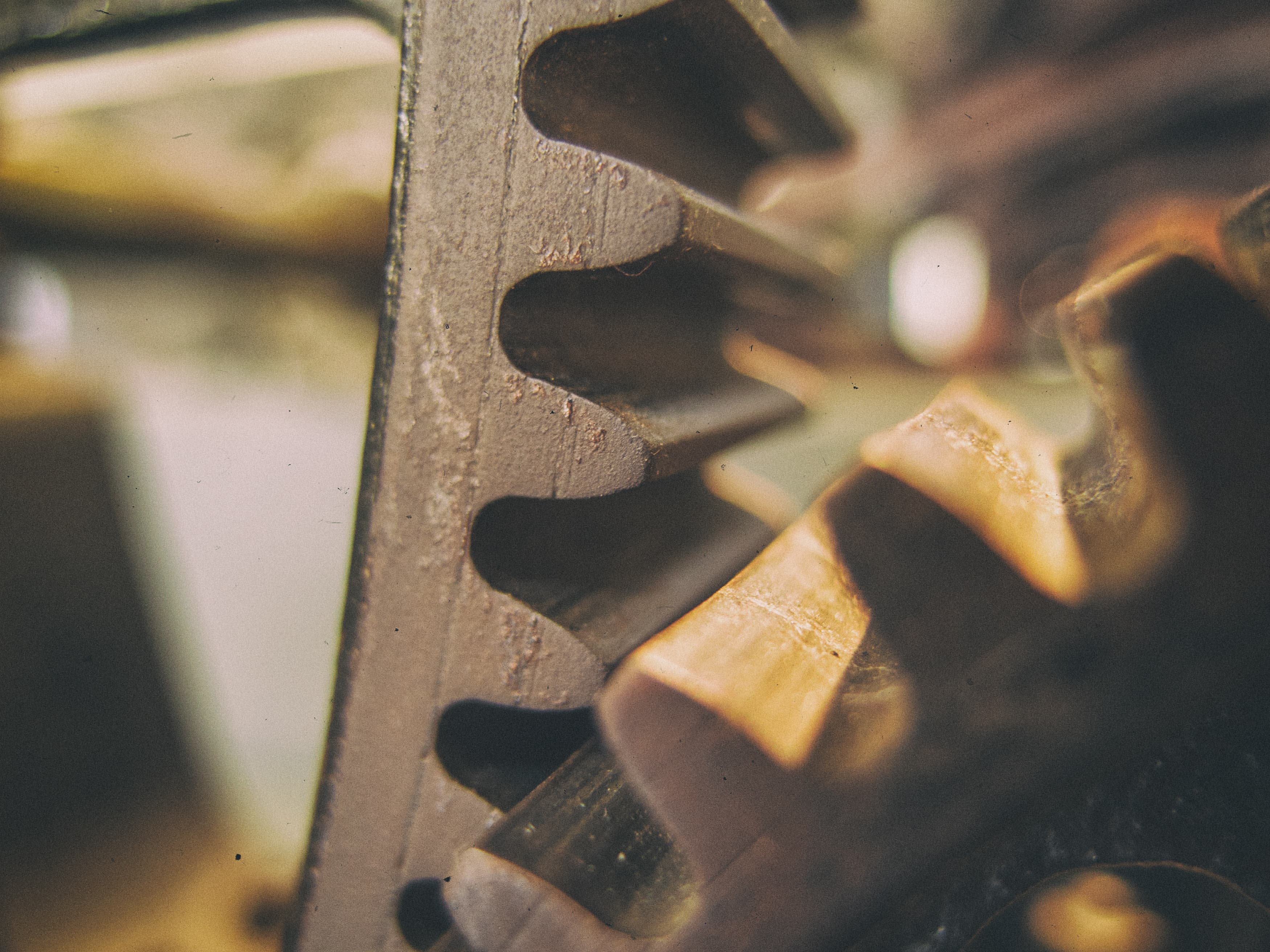 Close-up photo of interlocking metal gears
